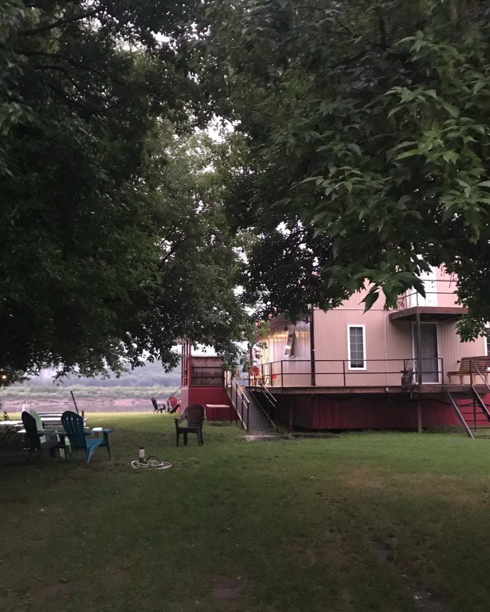 Carcajou getaway by Cozy Corner Guest Home in La Crete Alberta main cottage rear view mobile